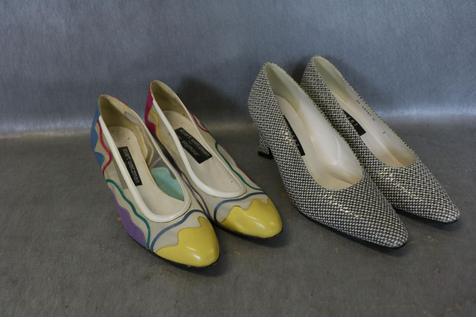 2 Pair Stuart Weitzman Shoes: Colorful wedge heel shoe is size 7, Spain, light wear. Black & white check shoe is size 7, Spain, light wear.