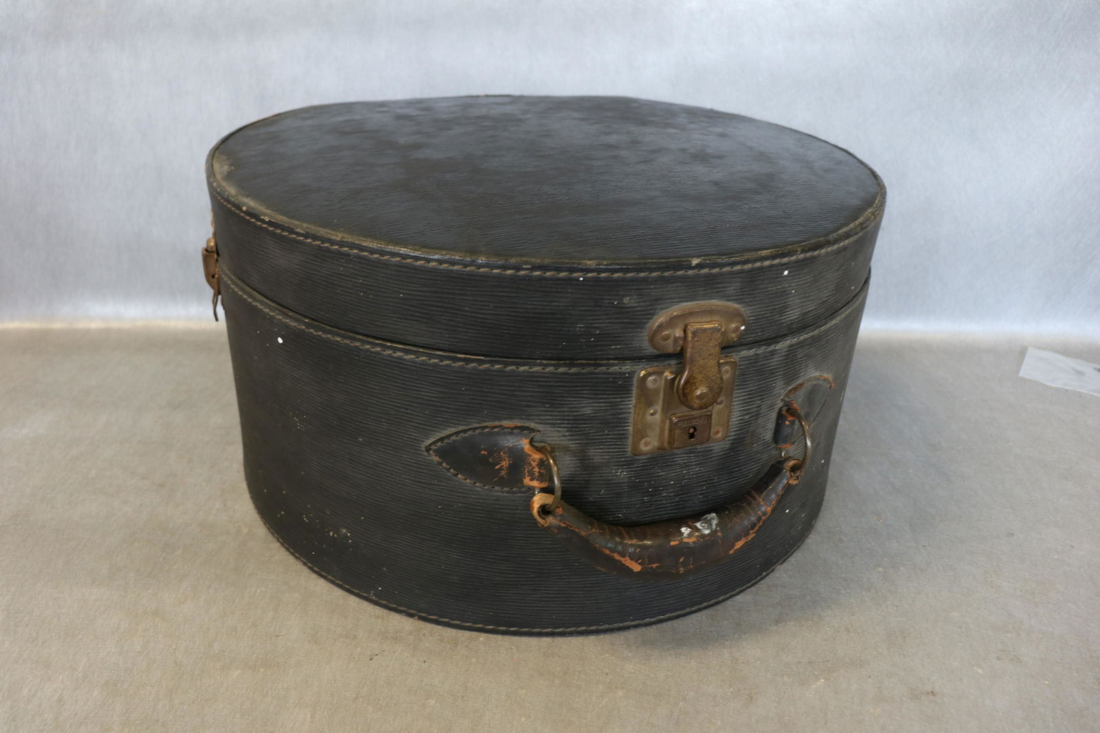 Antique Hat Box Luggage Case: Approx. 18" across, 9" tall. Monogrammed A B W. Light wear.