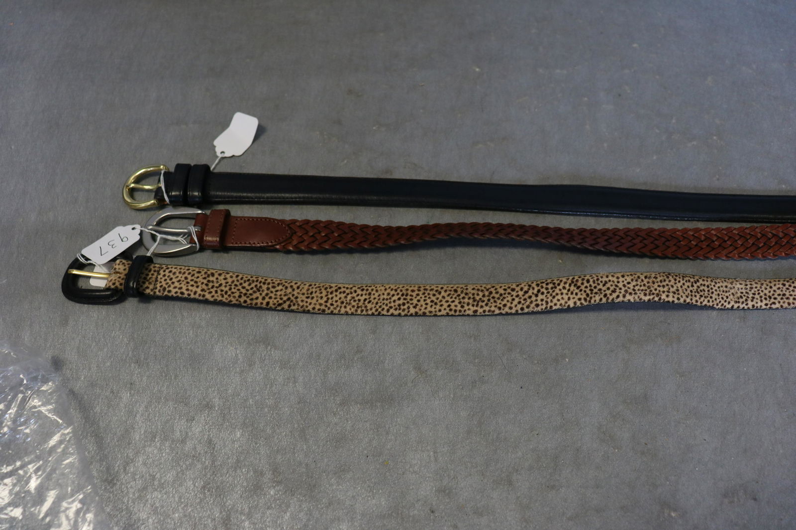 Lot of 3 Ladies Coach and Talbots Leather Belts: Coach brown braided belt, size large. Coach navy leather belt, large. Talbots XL leather w painted fur. All in great condition.