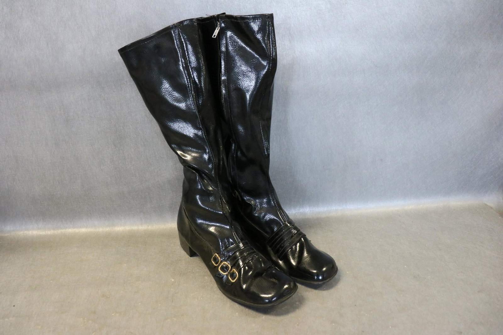Vintage Intranite Patent Leather Women's Boots: Inside zipper, faux buckles on foot, Made by Intranite Hong Kong, marked size 9. Light soil, seam repair needed on right front foot.