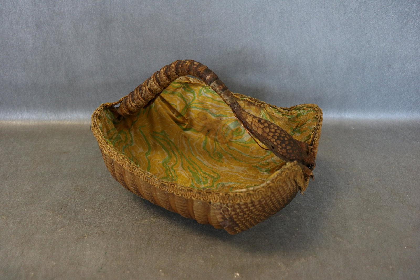 Vintage Armadillo Basket Bag: Unusual design; tail for handle, entire shell is used in basket, lined (needs a few stitches to hold in place). Approx. 11 1/2" long, 9" across and 8" tall.