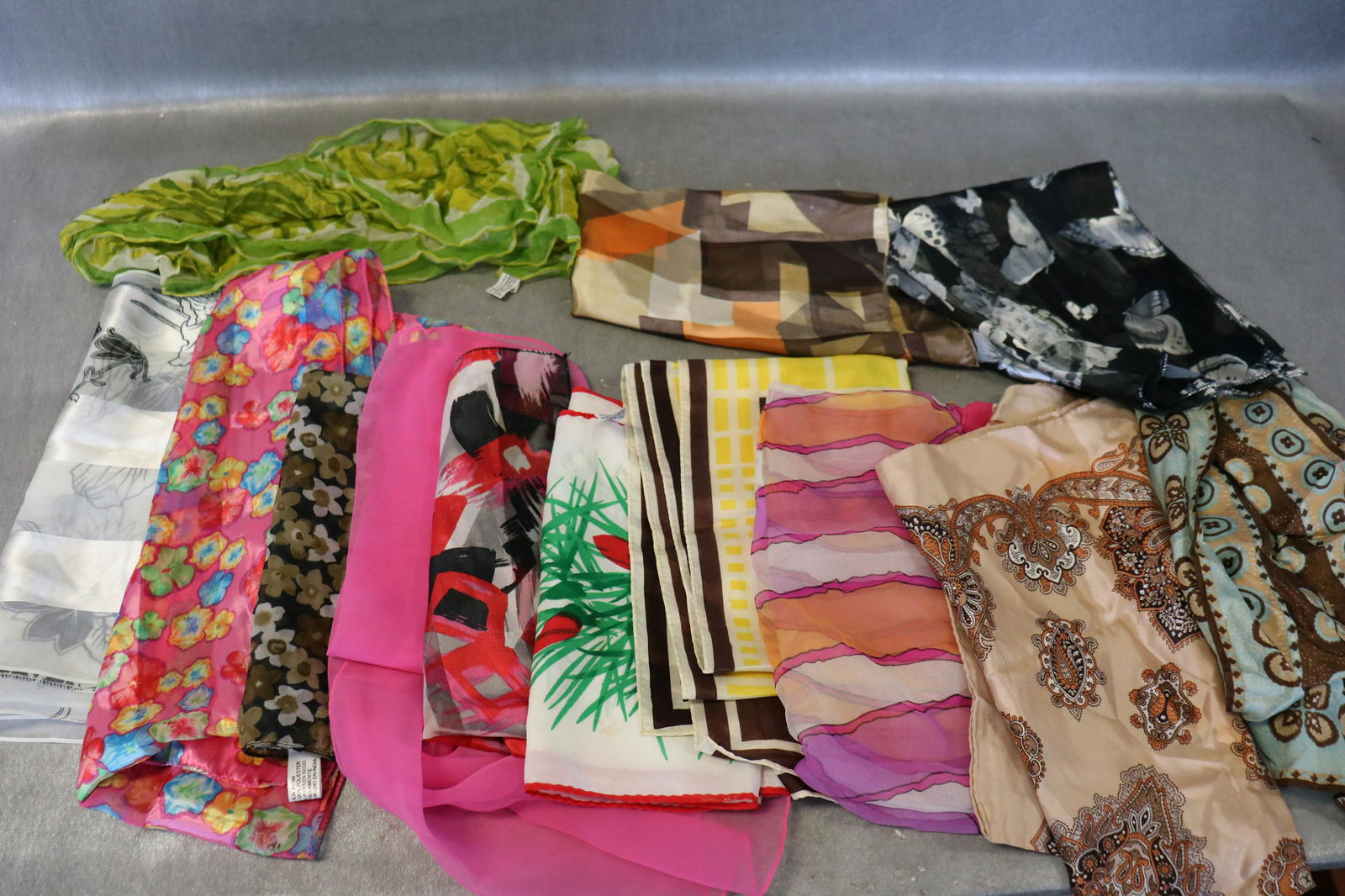 Lot Of 13 Vintage Scarves, Vera: 3 Vera scarves, variety of styles, sizes, materials, hand rolled edges. The Vera scarf with Christmas colors has light soil.
