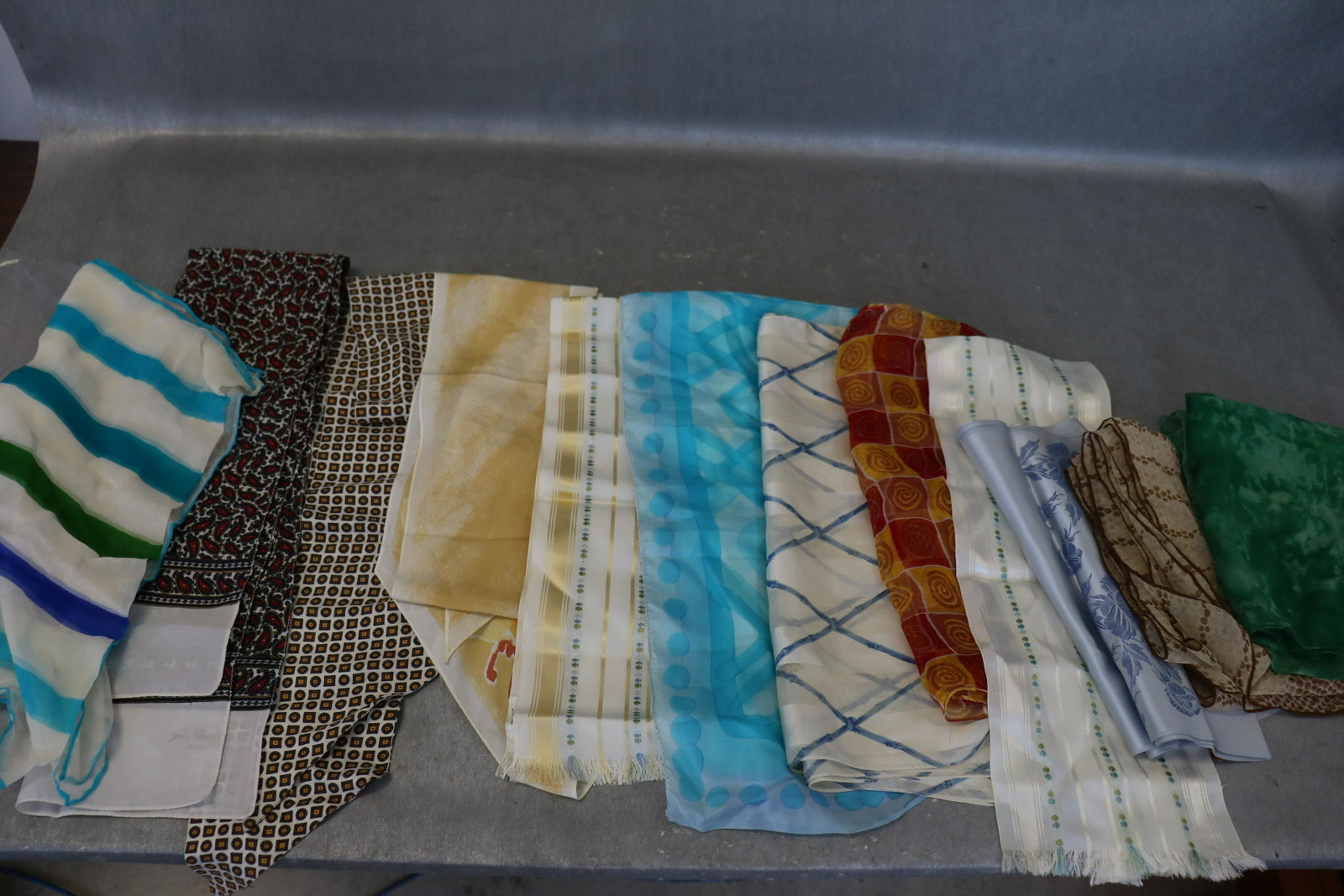 Lot of 12 Vintage Scarves: Some with rolled edges. Yellow scarf marked Veresa by Vera. Light soil found on a few.