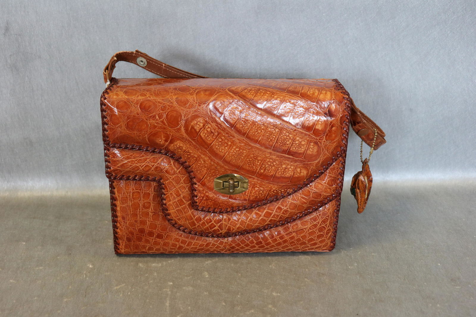 Vintage Alligator Handbag With Alligator Head Keychain: Stamped Made In Cuba, approx. 10" long, 8" tall, 3 1/2" deep, two compartments, adjustable straps, Very little wear, a few creases on strap from handling.