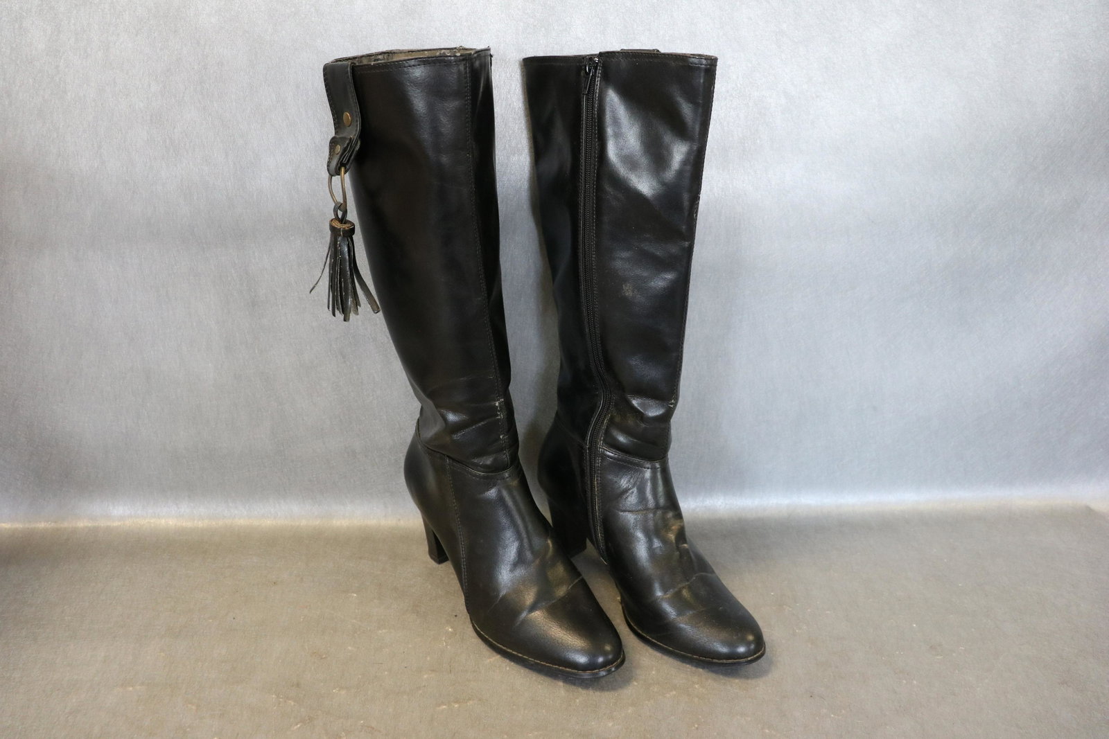 Pair Crazy Horse Black Tall Boots: Side zipper, 3" heel, size 9 1/2, in very good condition. Believed to be faux leather.