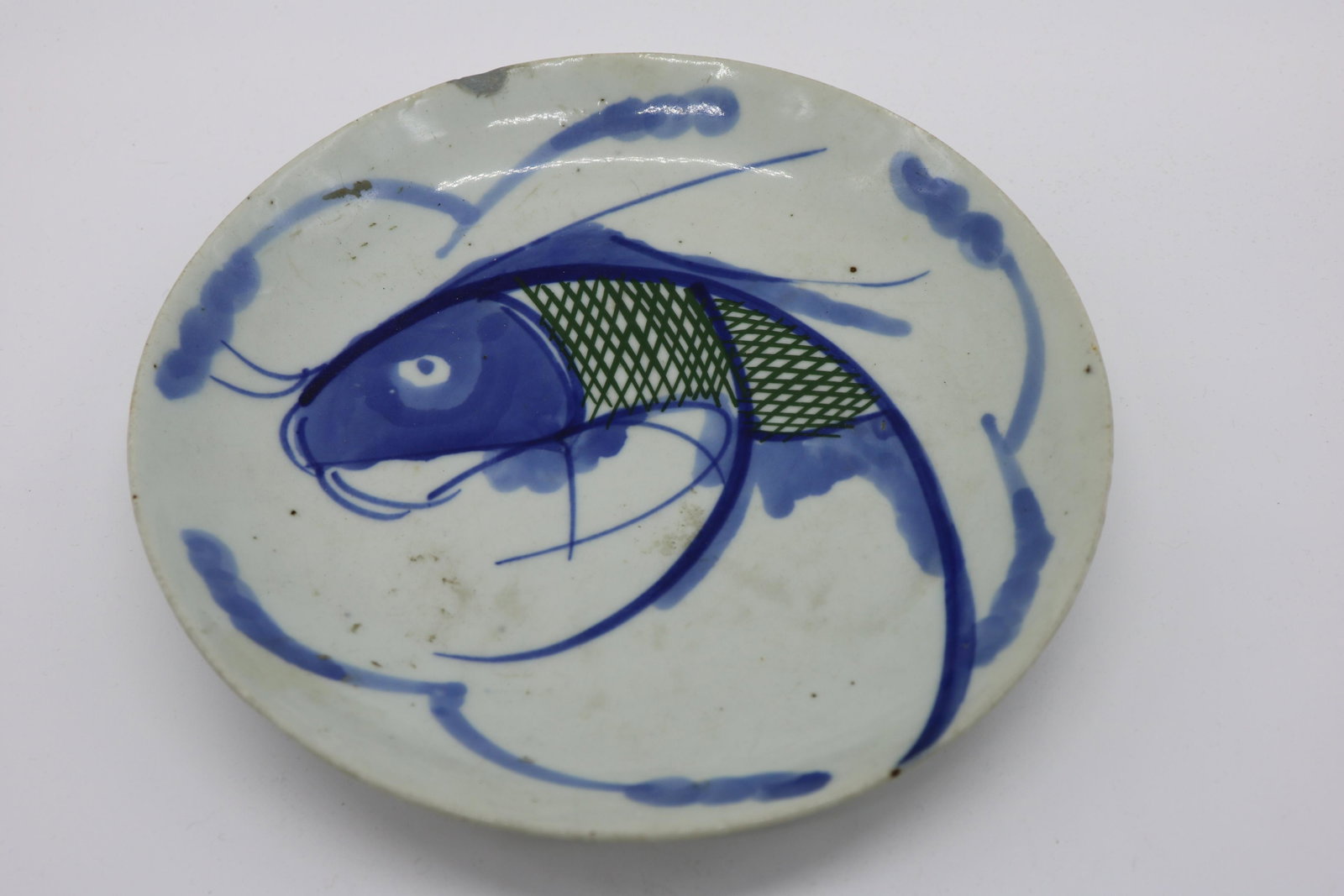 Antique Asian Blue & White Fish Dish: hand painted blue with green, old chip, see photo's, approx. 7 1/2 inches across
