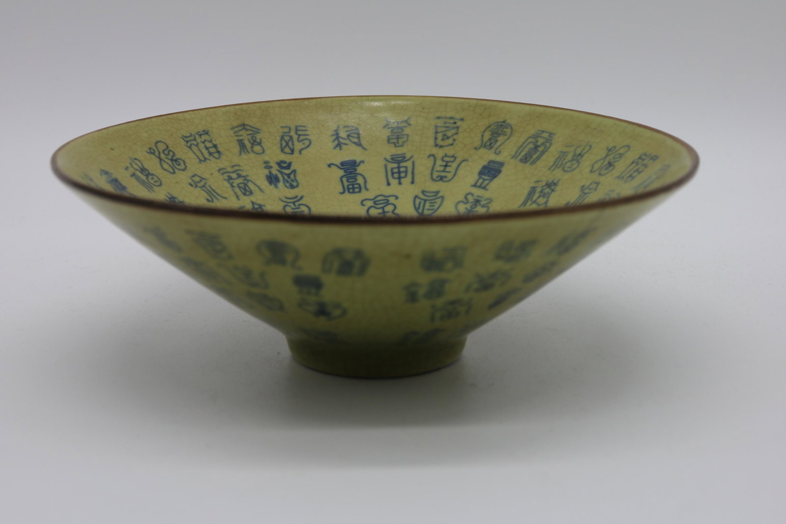 Asian Green Porcelain Bowl, Old Style Calligraphy,: hand painted blue Old Style Chinese Letters on green, signed, approx. 8 inches across, 2 3/4 wide, hair line crack see photo's