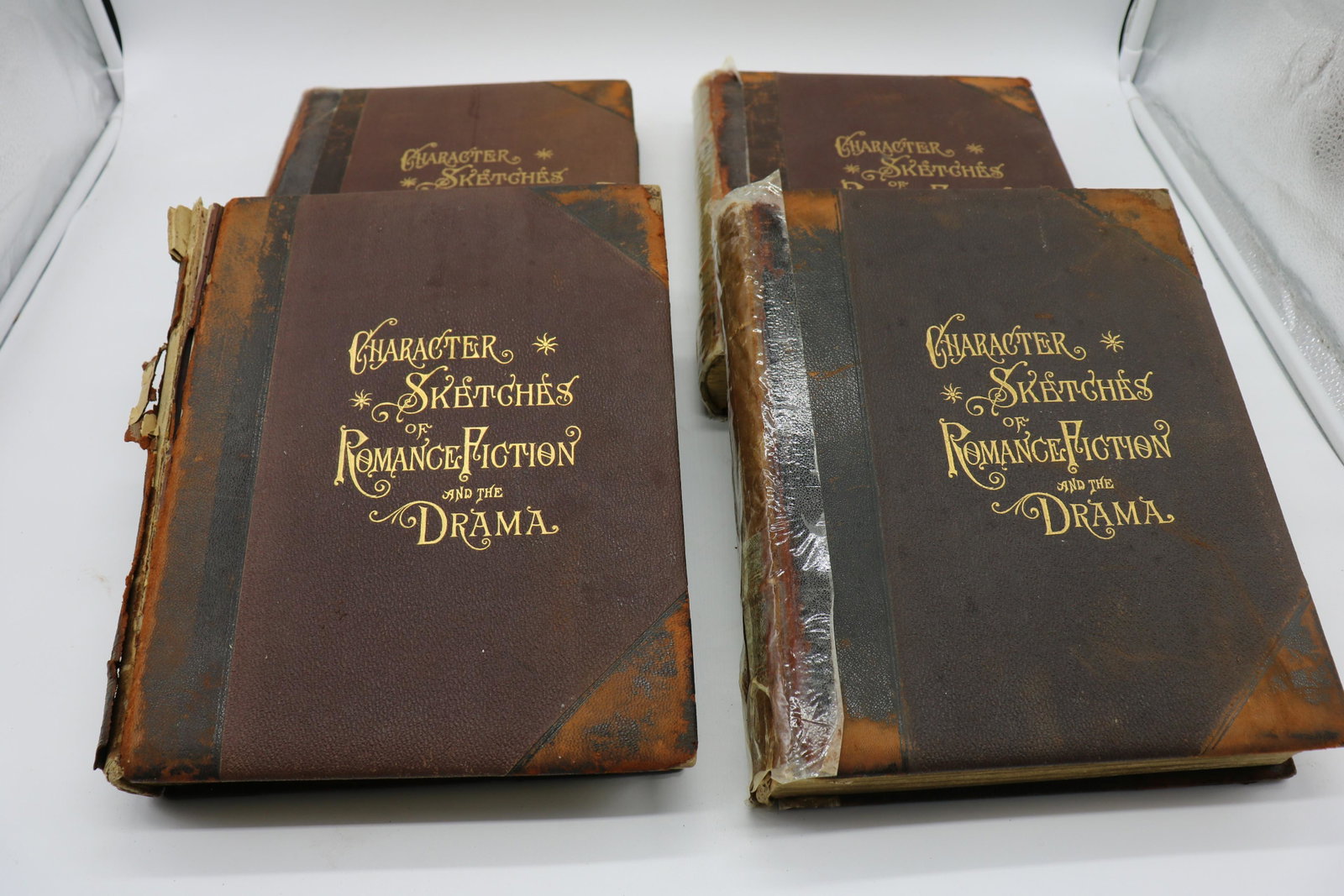 Lot Of 4 1892 Character Sketches Of Romantic Fiction,: Volumes 1-4. Binding in worn condition, books approx. 10x12 and 2" thick, approx. 400 pages.