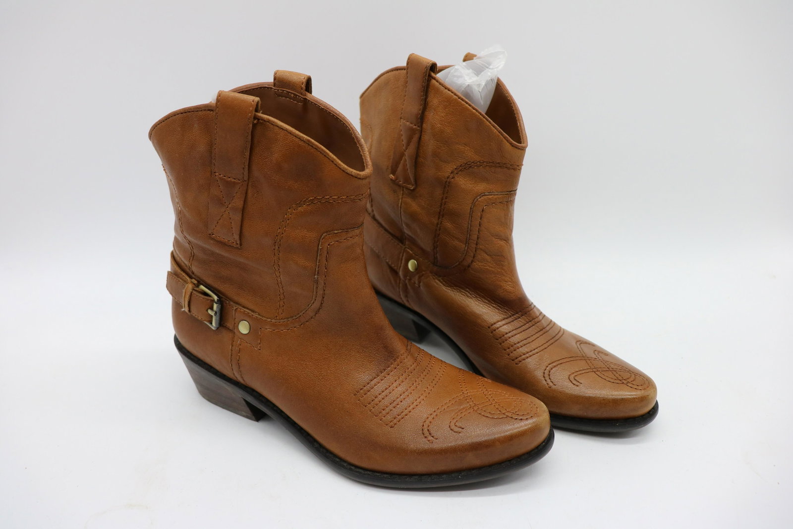 Franko Sarto Leather Cowboy Boots: Top-stitching design, buckles at sides, size 6, approx. 1 1/2" heel, a little wear on toe, see photos.