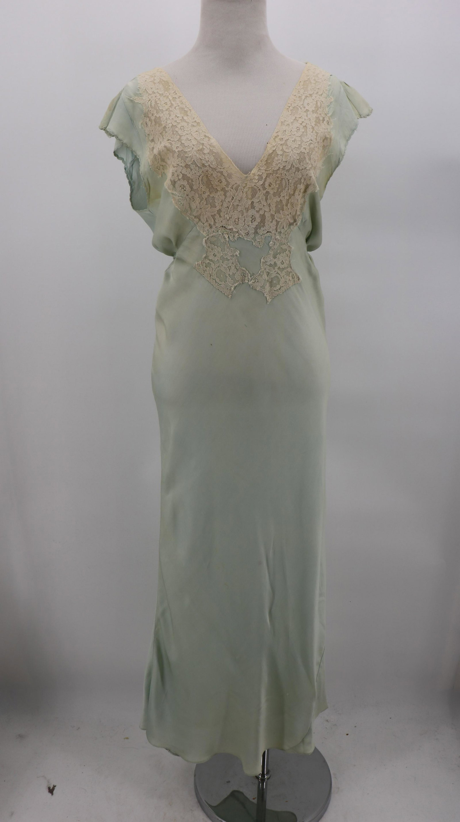 1930's Mint Green Negligee with Lace: cap sleeves, insert Lace V-neck empire waist with lace band ties in back, full length, bias cut, silk or silk blend, approx. 38 bust, 34 under bust, some under arm stains, see photo's