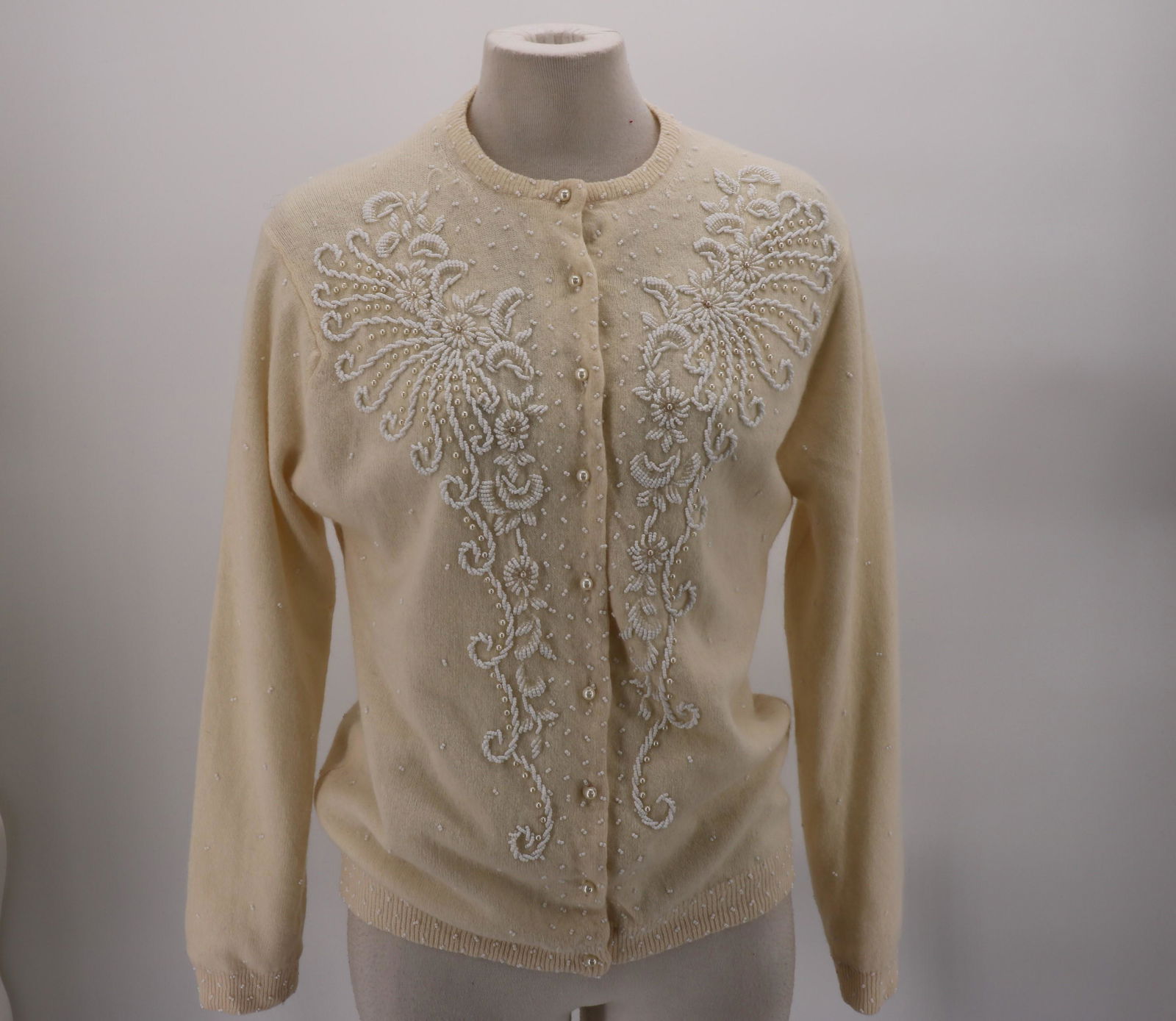 1950's Wool & Beaded Cardigan Sweater: cream color with white beading and pearl decoration, button front with pearl buttons, fully lined, size 42, small hole found, see photo