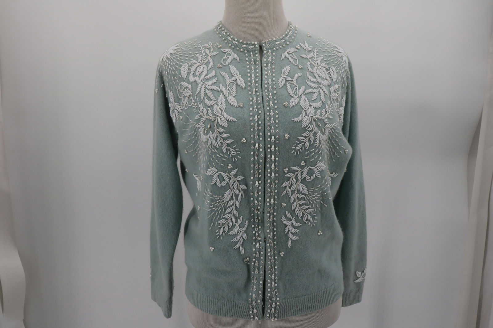 1950's Blue Angora Wool Cardigan with Beading: tiny white and pearl beaded flowers beading around collar and down the front, 3/4 sleeves, fully lined, old poorly done repairs on back, some minor spots, some bead loss , some small holes in lining,