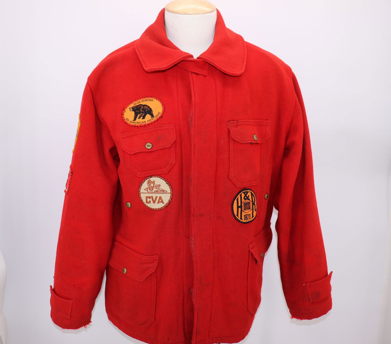 Vintage Red Wool Hunting Jacket, Woolrich woolen Mills: hidden button front, upper and lower flap over pockets, large side snap shut pockets, back side button pockets, large inside pocket, 7 great patches including smith & Wesson, nice large size approx. 5