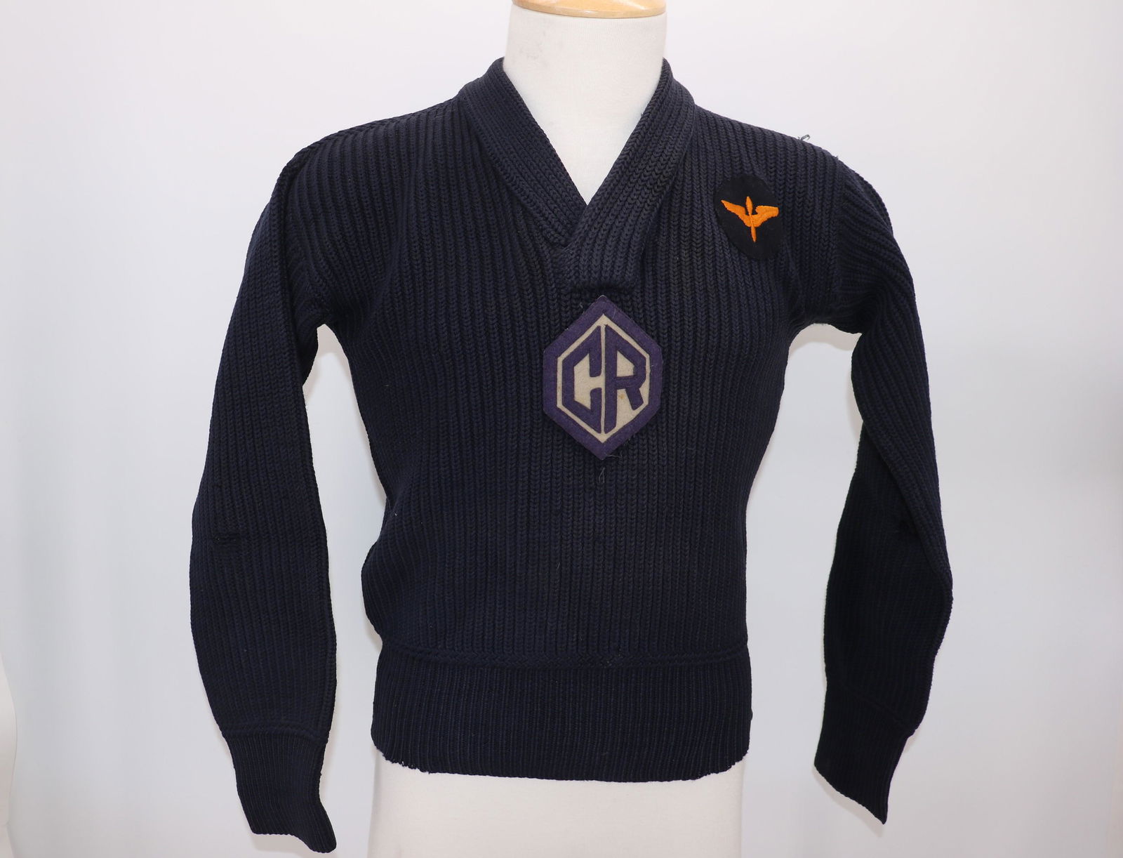 1930's Men's Wool Camp Sweater, R H Macy & Co.: Navy Blue wool knit, rolled V-neck sweater with wide band at waist and sleeve cuffs, 2 Patches one with CR, the other with wings, some damages noted see photo's, approx. 42 chest 32 waist with stretch