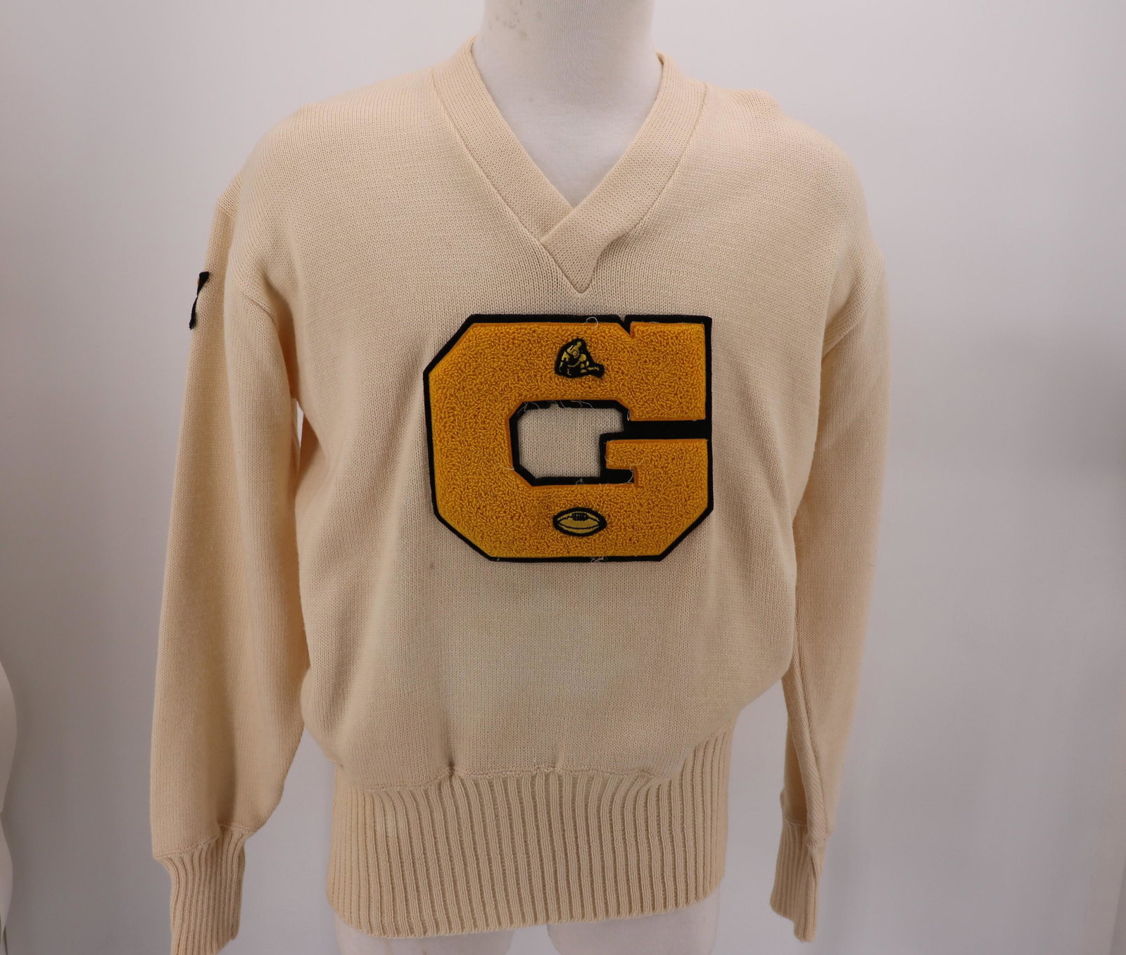 Men's Wool Military Football Letter Sweater: new/era sportswear, virgin wool, V-neck, foot ball patch, 67 & rank, long ribbing at cuffs and waist, size 48, great condition