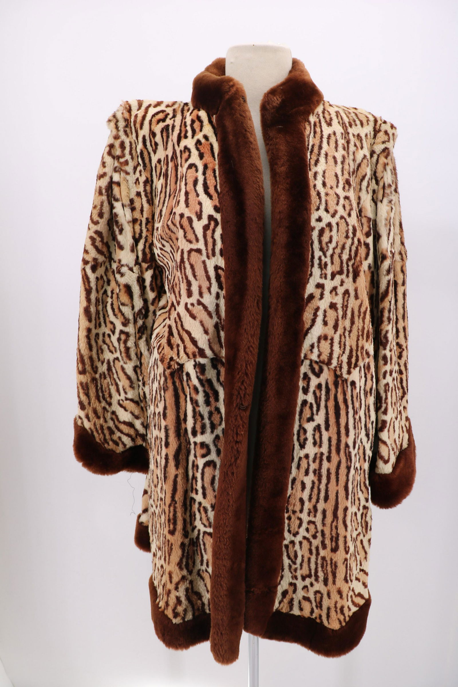 1930's Cheetah Print Fur & Beaver Fur Trim Coat: Kerrybrooke Fashions; One hook & loop in front, fully lined, approx. 40 bust. Sleeves have been altered at cuffs. Light soil on lining, lining needs seam repair in a few places. 3" tear on one shoulde