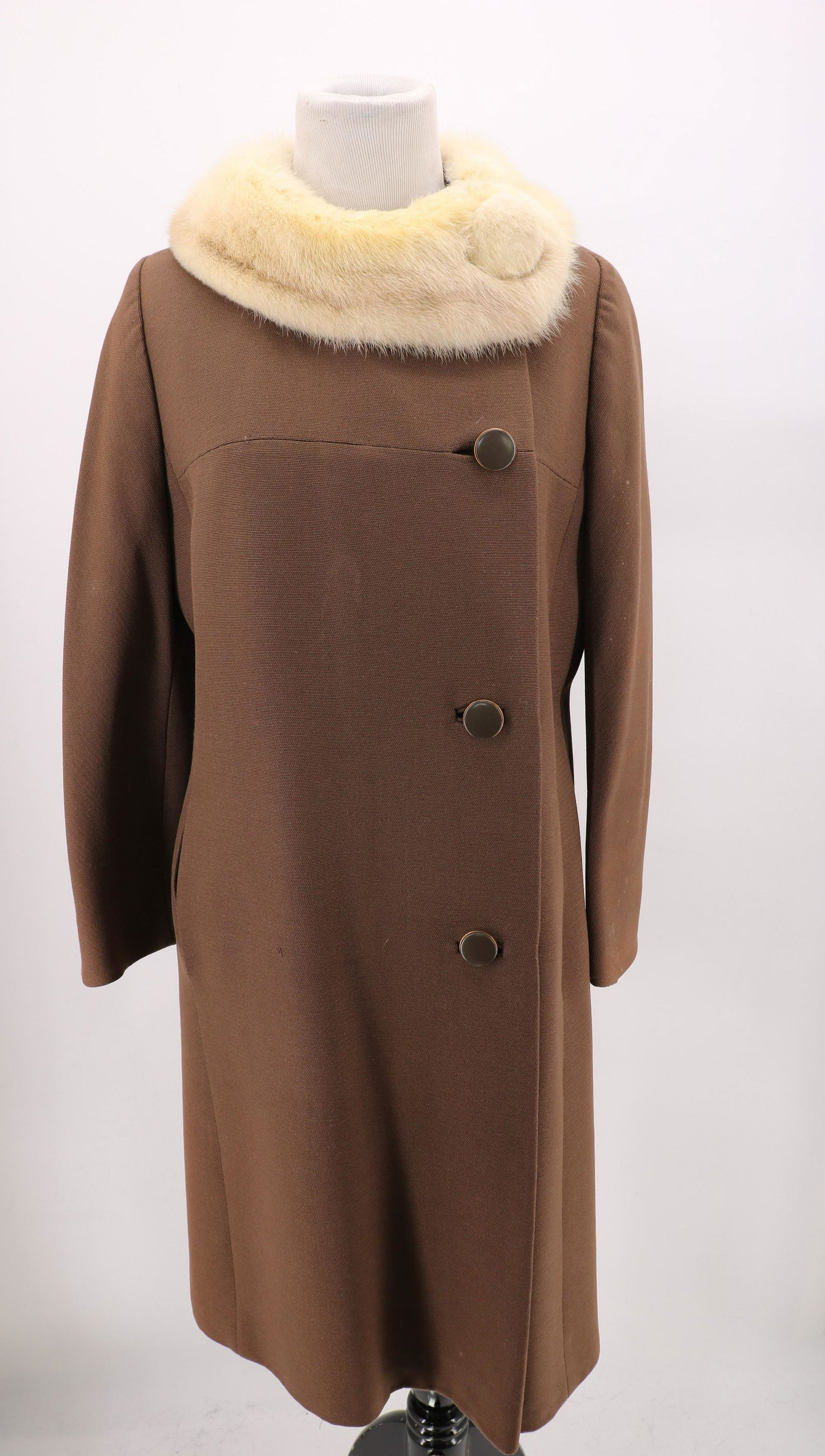 1960 Sycamore Brown Coat With Mink Collar: Made for RH Stearns Co., With decorative buttons in front, fully lined, mink collar with covered buttons, approx. 38 bust, 34 waist, some wear showing on lining, especially at back of neck, underarms,