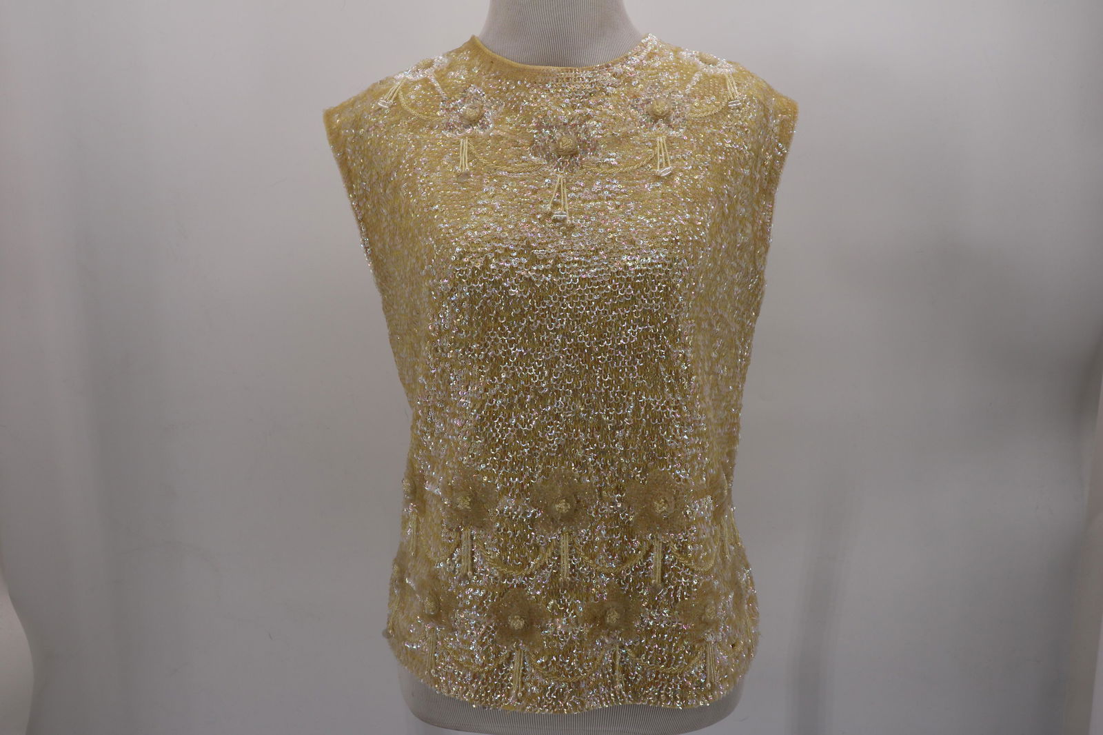 1950's Wool Sequined Sweater: Separating metal zipper in back, silk lining (some damage), approx. 36 bust. Some sequin loss.