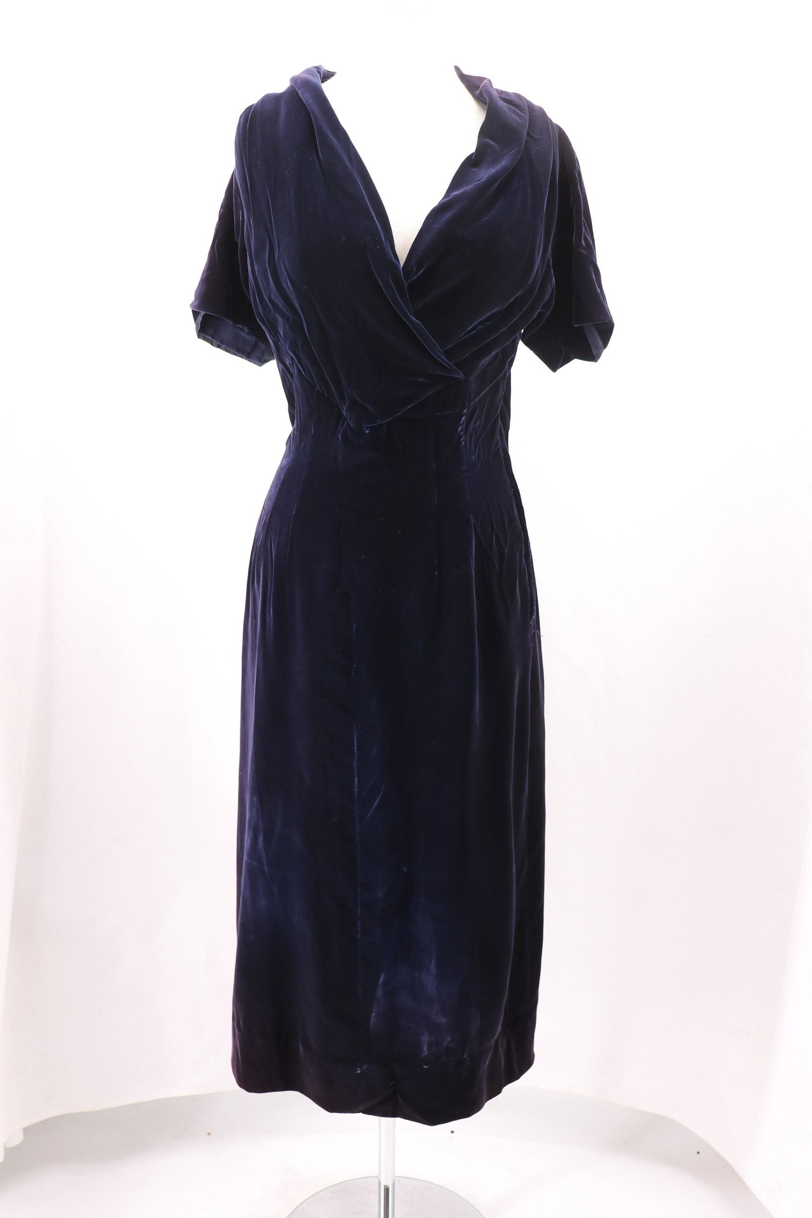 Vintage 1950's Jacques Fath Deep Purple Velvet Dress: Designed for Joseph Halpert, cross-over deep V-neck design in front, side metal zipper, approx. 34 bust, 30 waist. Some tiny holes found in the velvet, some seam repair needed at hem, collar and at zi