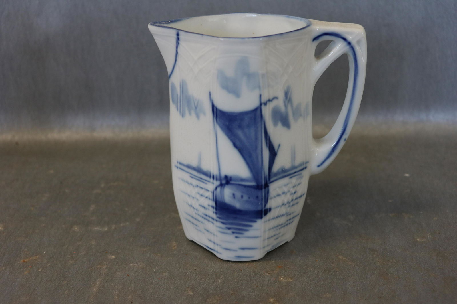 Flow Blue Creamer/Pitcher: hand painted sail boat, approx. 5 3/4 inches tall, great condition