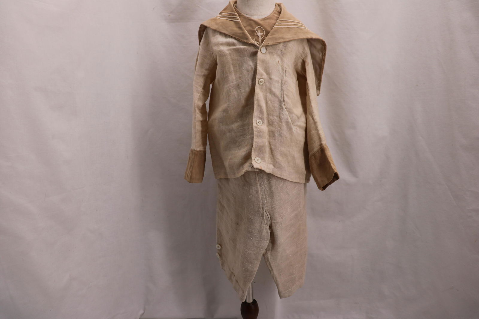 Little Boys Early Sail Nickers & Top: loose woven cotton with cotton trim, salior collar, long wide band cuff sleeves, button front with chest pocket, nickers button on either side with side slit pockets, in need of repair back seam, see