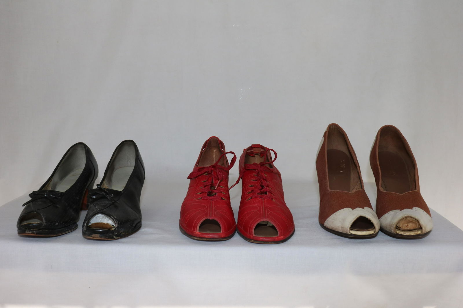 Lot of 3 Vintage Pair 1940's Peep Toe Heels: black red cross approx. size 7, re sling back peep toe approx. size 6 1/2, brown and white approx. size 7, all in worn condition