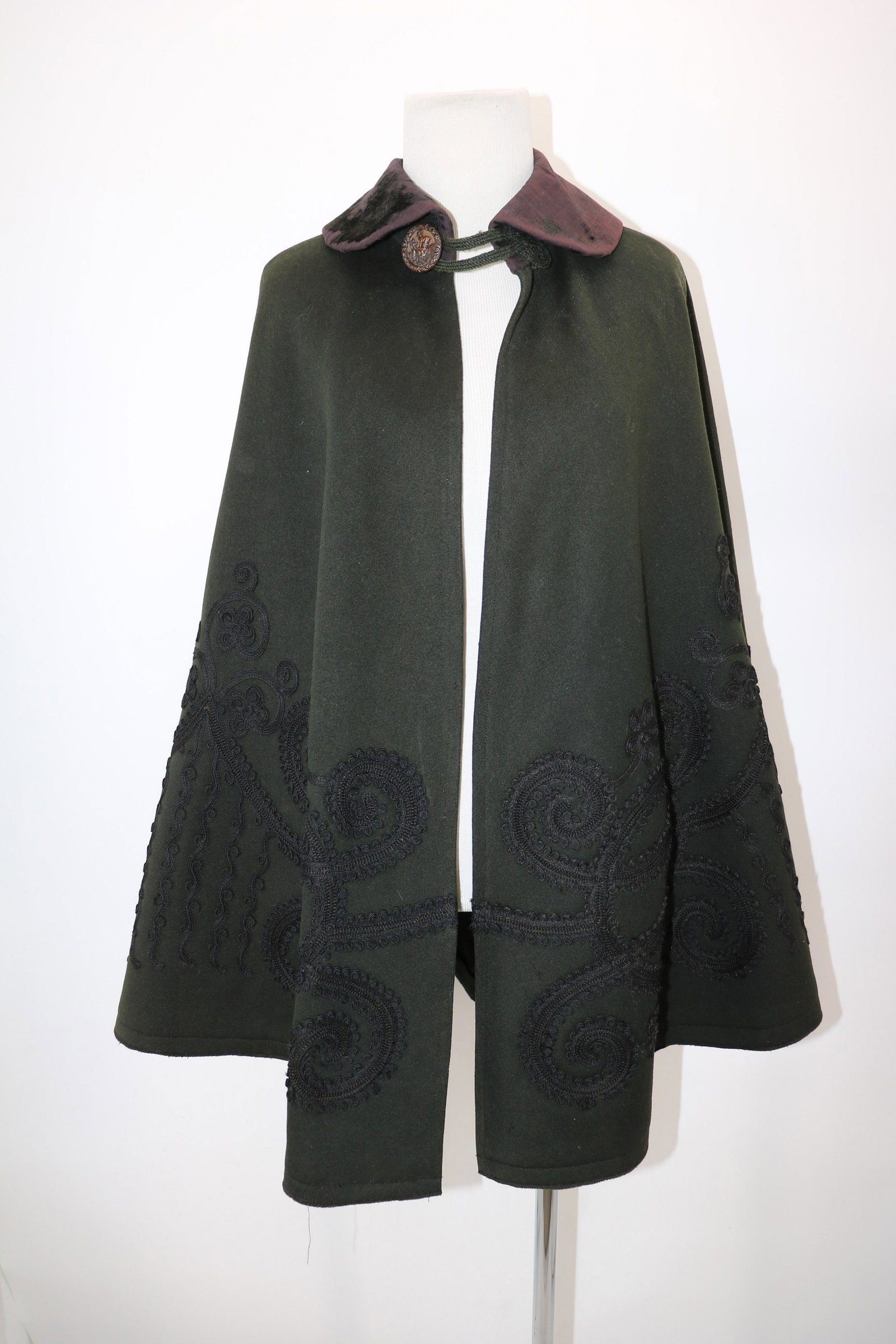 Black Victorian Wool Cape: Cord and kimp appliqued, antique metal button with Goat, velvet collar, (velvet is mostly worn off), nice condition, free size