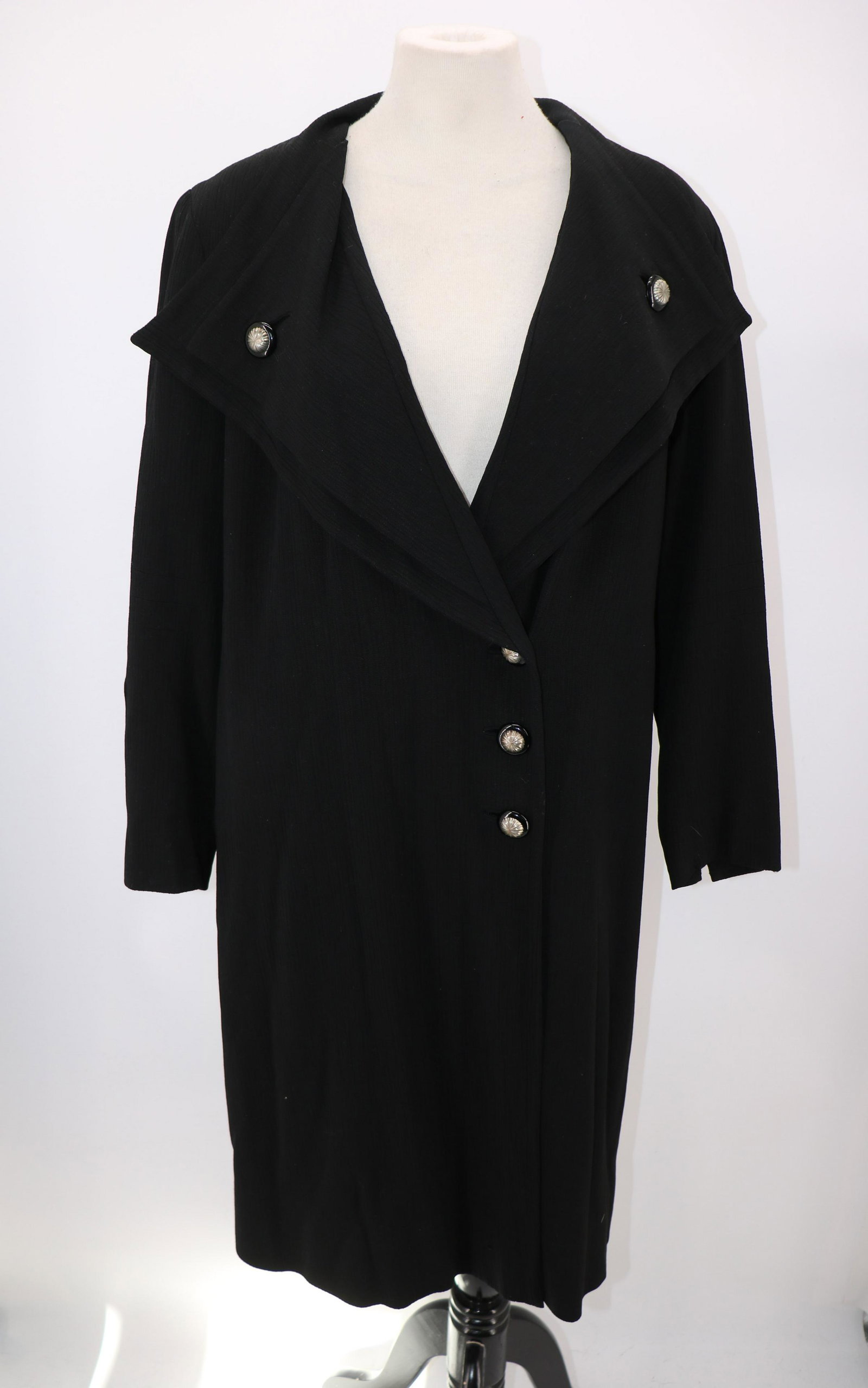 1940's Black Asymmetric Front Coat: black rayon blend crepe, large winged double layer front collar with buttons, closed to left side with 3 lower buttons, great sleeve detail, fully lined, seam repair needs at shoulder darts, approx. 4