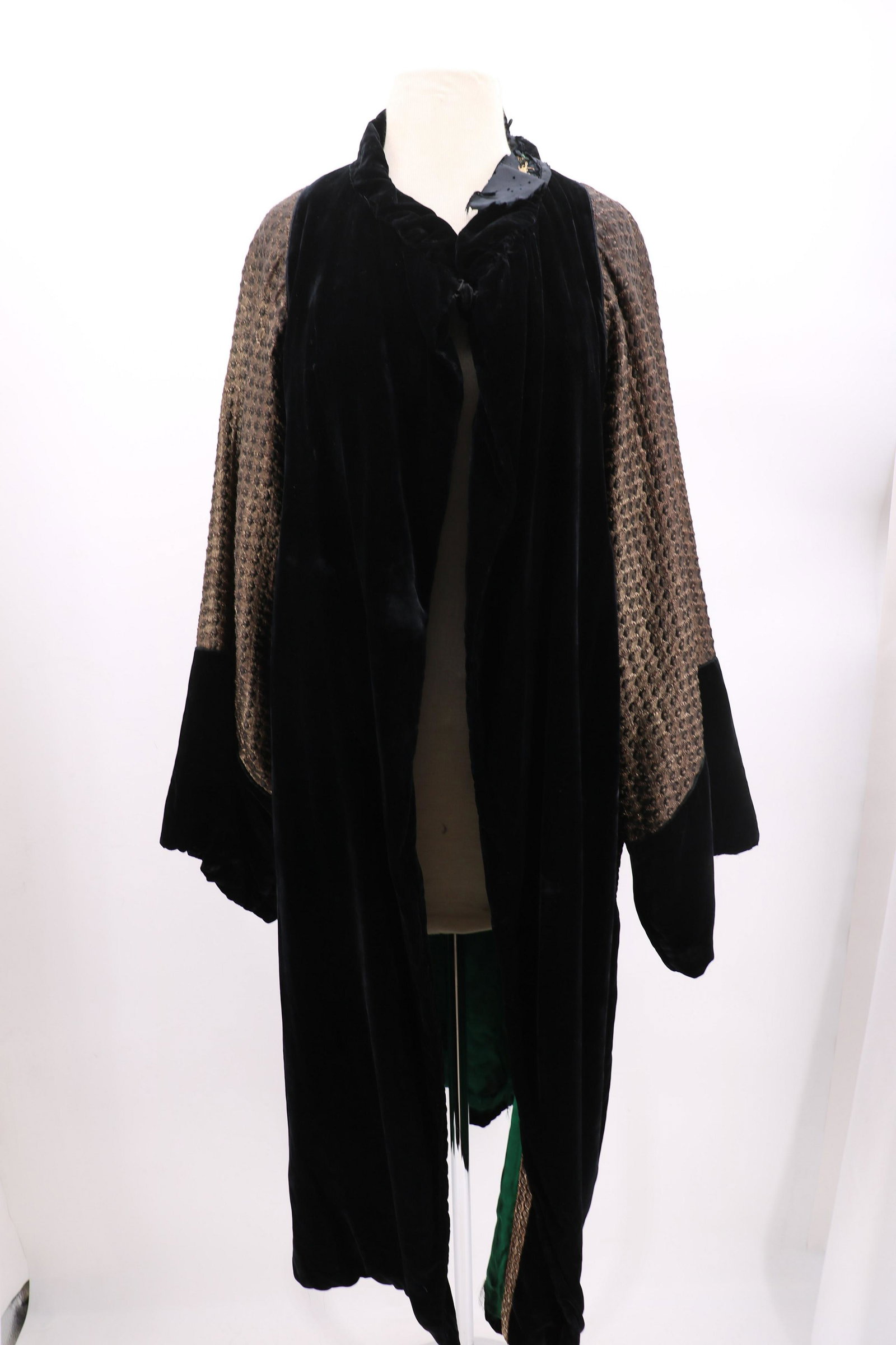 Antique Edwardian Velvet Cloak With Metallic Threads: Fully lined and insulated, one covered button in front, gathered neckline, approx. 36 bust, 47 long. Collar needs repair, lining has many small holes and rips at bottom hem edge. Some wear at cuff lin