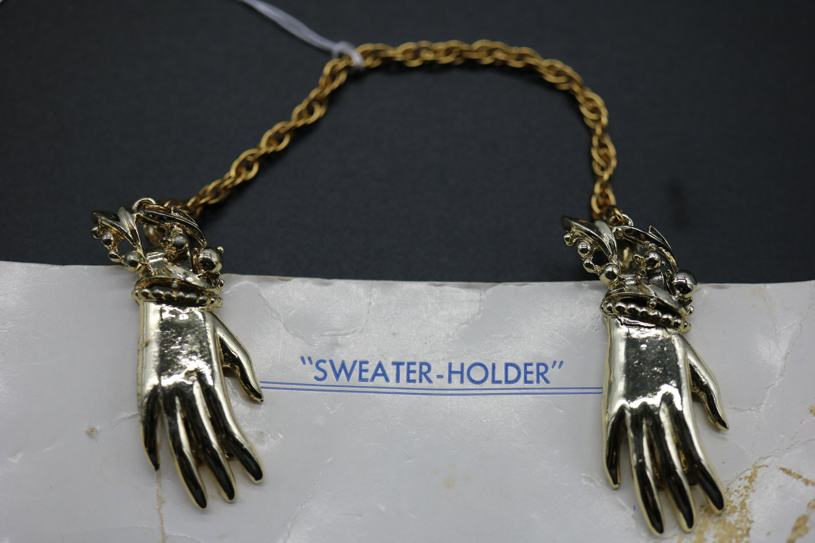 Vintage Sweater Clip with Hands: gold tone metal hand clips with chain