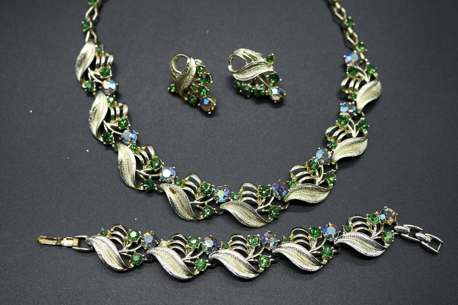 Vintage Necklace, Bracelet & Earring Set with: gold tone with green and irredescent stones, screw back earrings.