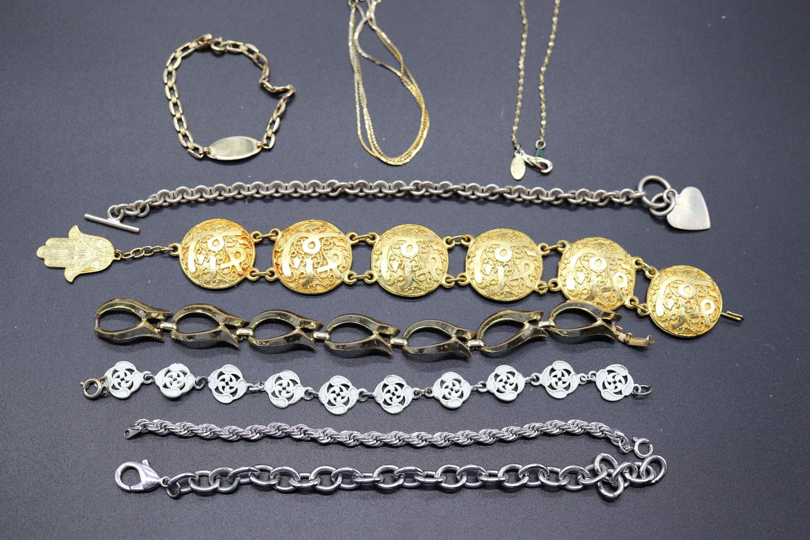 Lot of 10 Vintage Bracelets: various linked bracelets, one Morocco, one Corro, american showcase, and other unmarked