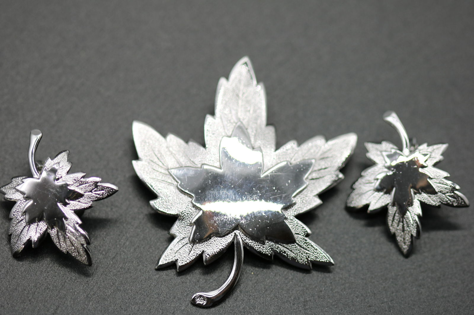 Vintage Monet Maple Leaf Brooch & Earring Set: silver tone, aprox. 2 1/4 brooch and matching clip on earrings