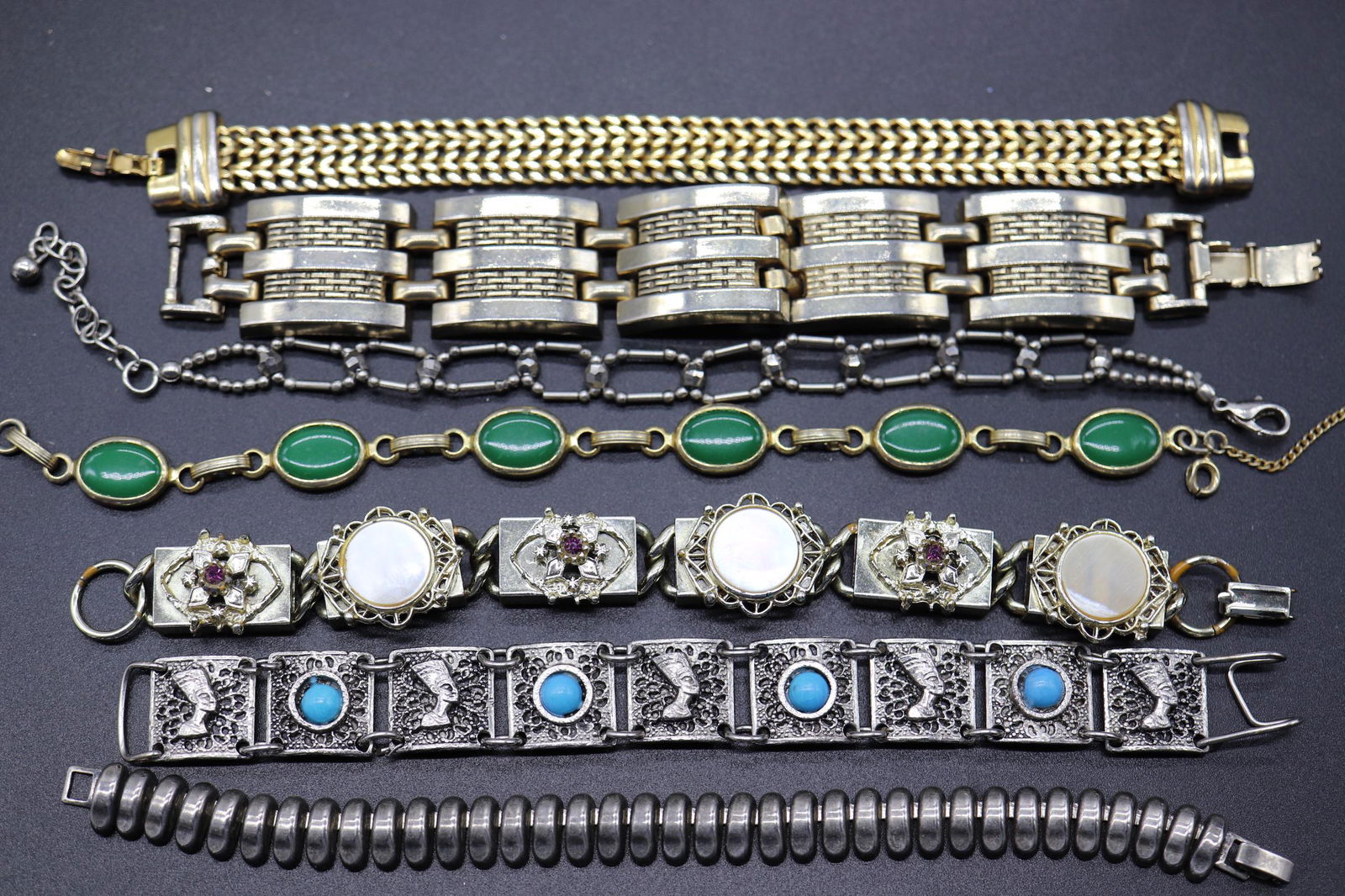 Lot of 7 Linked Bracelets, Monet: one signed Monet