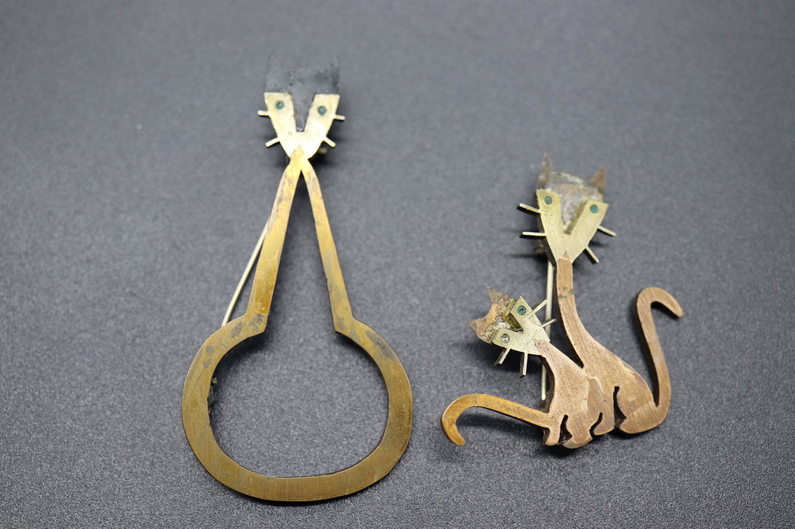 Two Metales Hecho En Mexico Cat Brooches: 2 funky MCM Cat Brooches with brass, sliver, turquoise and ebony, large one is 2 3/8 tall, shorter one is missing ebony and approx. 1 1/2 inches tall
