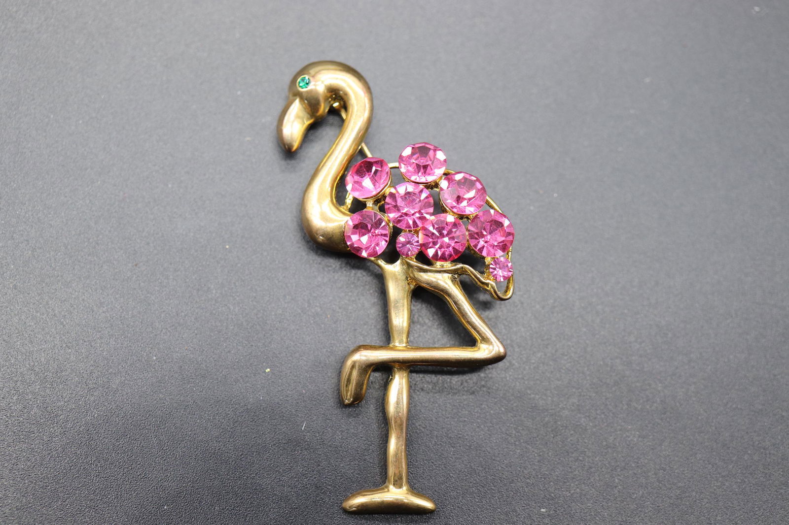 Large Vintage Flamingo Brooch: gold tone flamingo with green stone eye and Pink stone feathers