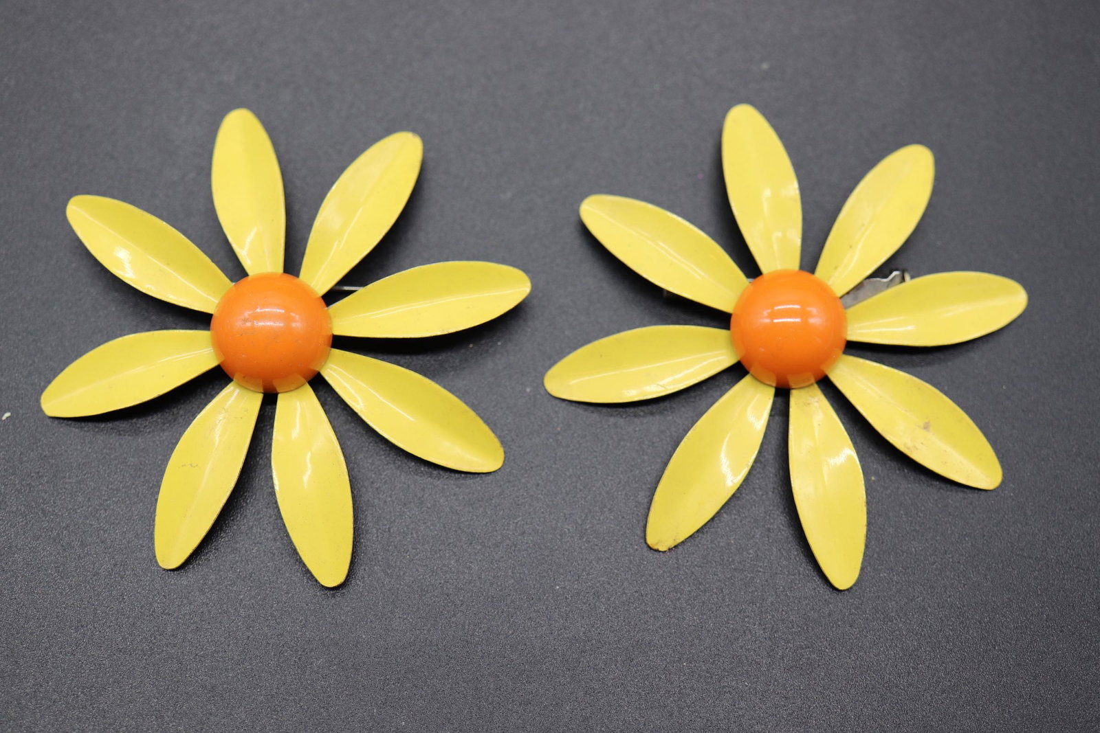 Pair of Vintage Enamel Daisy Brooches: yellow petals with orange center, approx. 2 3/4 inches each