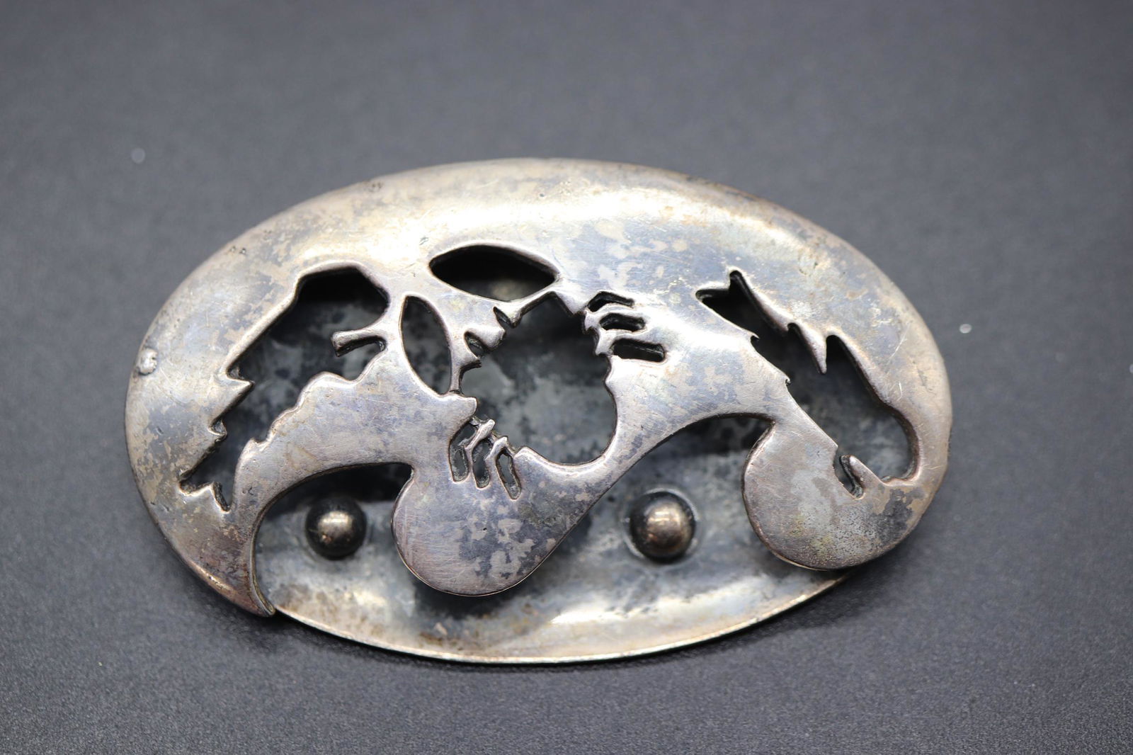 Vintage Coro Clam Shell Brooch with Cut out Crab & Fish: silver tone clam shell with 2 tiny silver pearls, cut out design of a crab and 2 fish, approx. 2 5/8 x 1 5/8 inches