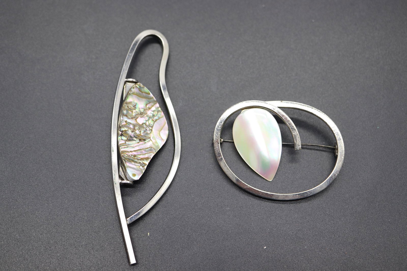 Large Vintage Brooch with Mother of Pearl & Abalone: silver tone with tear drop mother of pearl and abalone piece, approx. 3 3/4 x 1 3/4 inches