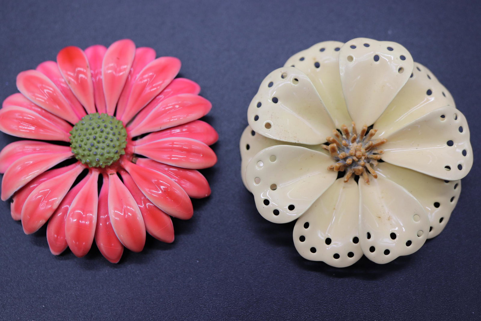 Lot of 2 Vintage 3-D Enamel Flower Brooches: pale yellow with raised stigma center, approx. 2 1/4 inches, peach colored with green center, approx. 2 1/2 inches