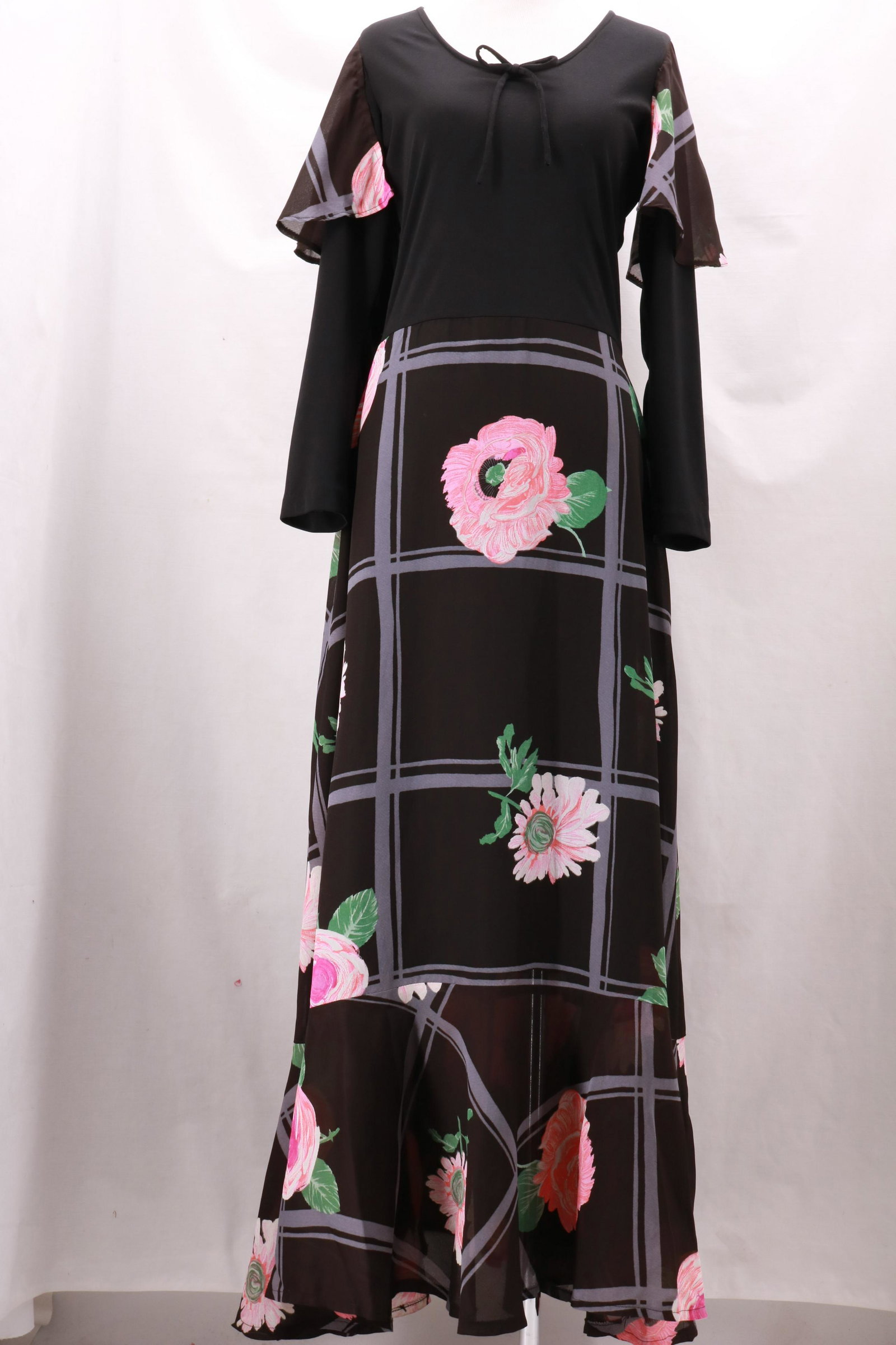 Vintage 1970's KADIX Polyester Black and Floral Maxi: Vintage 1970's KADIX Polyester Black and Floral Maxi Dress with large floral motif and bow detail at center of the scoop neck. Approximate measurements: Bust 34", Waist 26"