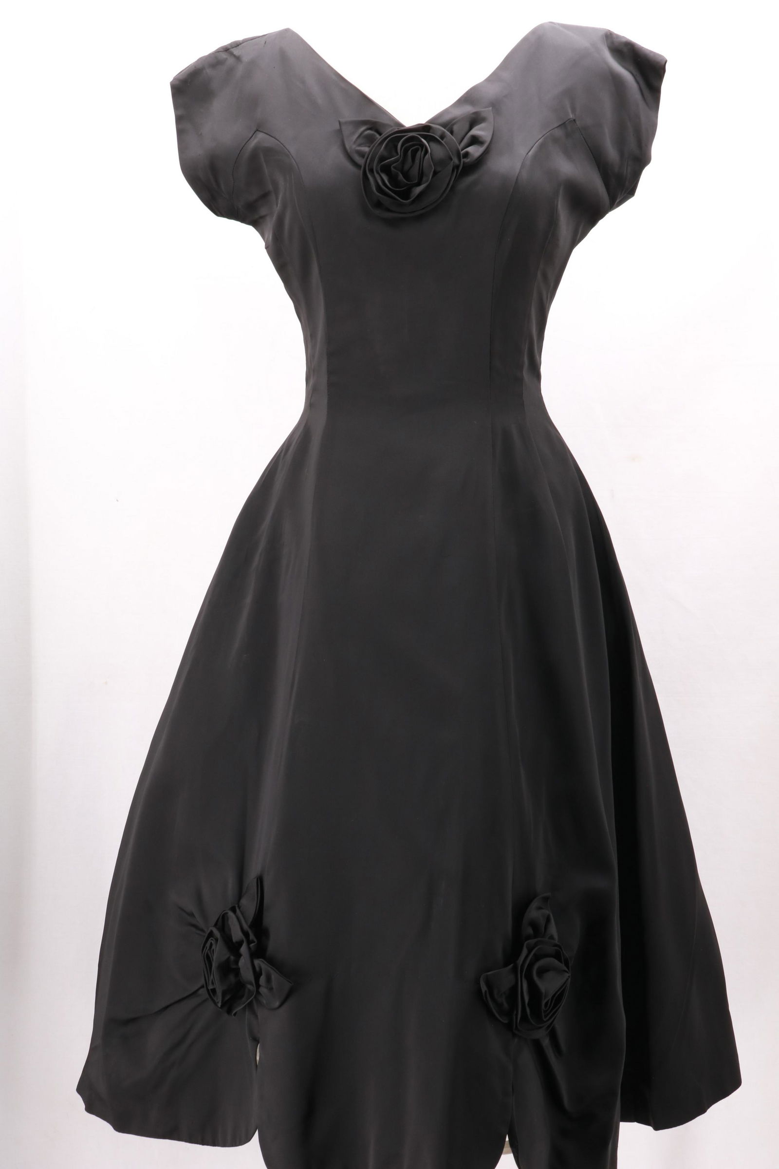 Vintage 1950's Taffeta Cocktail Dress with Satin Rose: Vintage 1950's Taffeta Cocktail Dress with Satin Rose Accents and a fabulous scalloped hemline. Metal zip closure at the back. Tiny tear in fabric at the right shoulder- see photos. Approximate measur