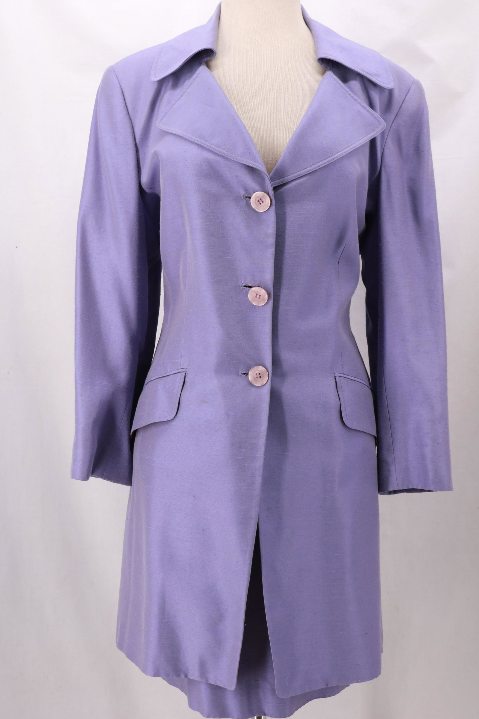 Vintage TAHARI 2-Piece Lavender Skirt Suit with Long: Vintage TAHARI 2-Piece Lavender Skirt Suit with Long Jacket. This suit has the look and feel of silk shantung. It is actually a blend of 57% Rayon and 43% Acetate. Both pieces are fully lined. The jac