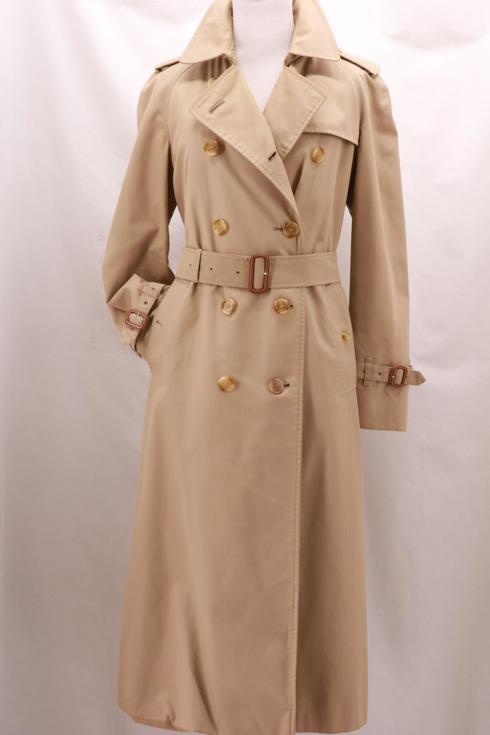 BURBERRY'S Double Breasted Trench Coat with Removeable: BURBERRY'S Double Breasted Trench Coat with Removeable Nova Check Wool Warmer with all of the hallmarks of a classic Burberry trench: gun flap at left chest, storm flap at rear, epaulettes at shoulder