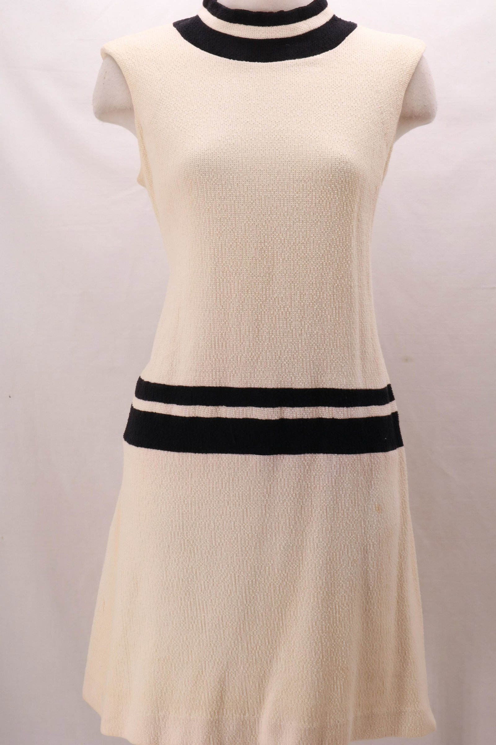 Vintage 1960's KAY WINDSOR Cotton Blend Boucle Dress: Vintage KAY WINDSOR Boucle Dress- cream with navy blue horizontal accent stripes give it a nautical look. Cotton blend stretch knit. 16" rear zip opening with double hook and eye at the back of the ne