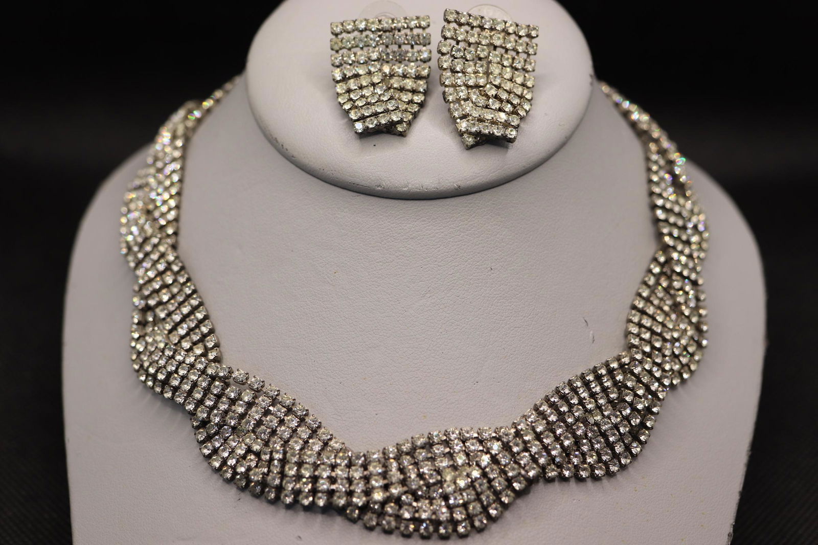 Stunning Twisted Rhinestone Necklace & Matching: silver tone with rows of rhinestones, peirced earrings, backing of earrings marked Monet