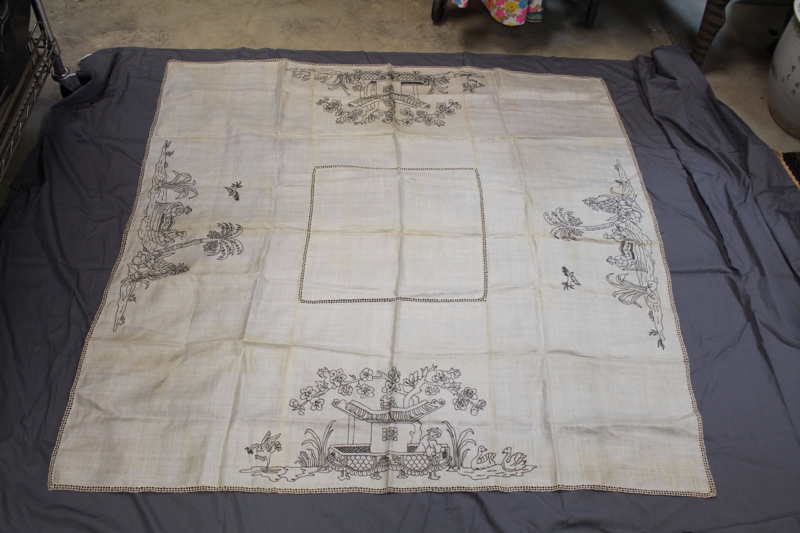 Vintage Silk Embroidered Lucheon Table Cloth, Asian: hand embroidered with palm trees, people, swans in an asian motif, approx. 50 x 50, fold and age soil