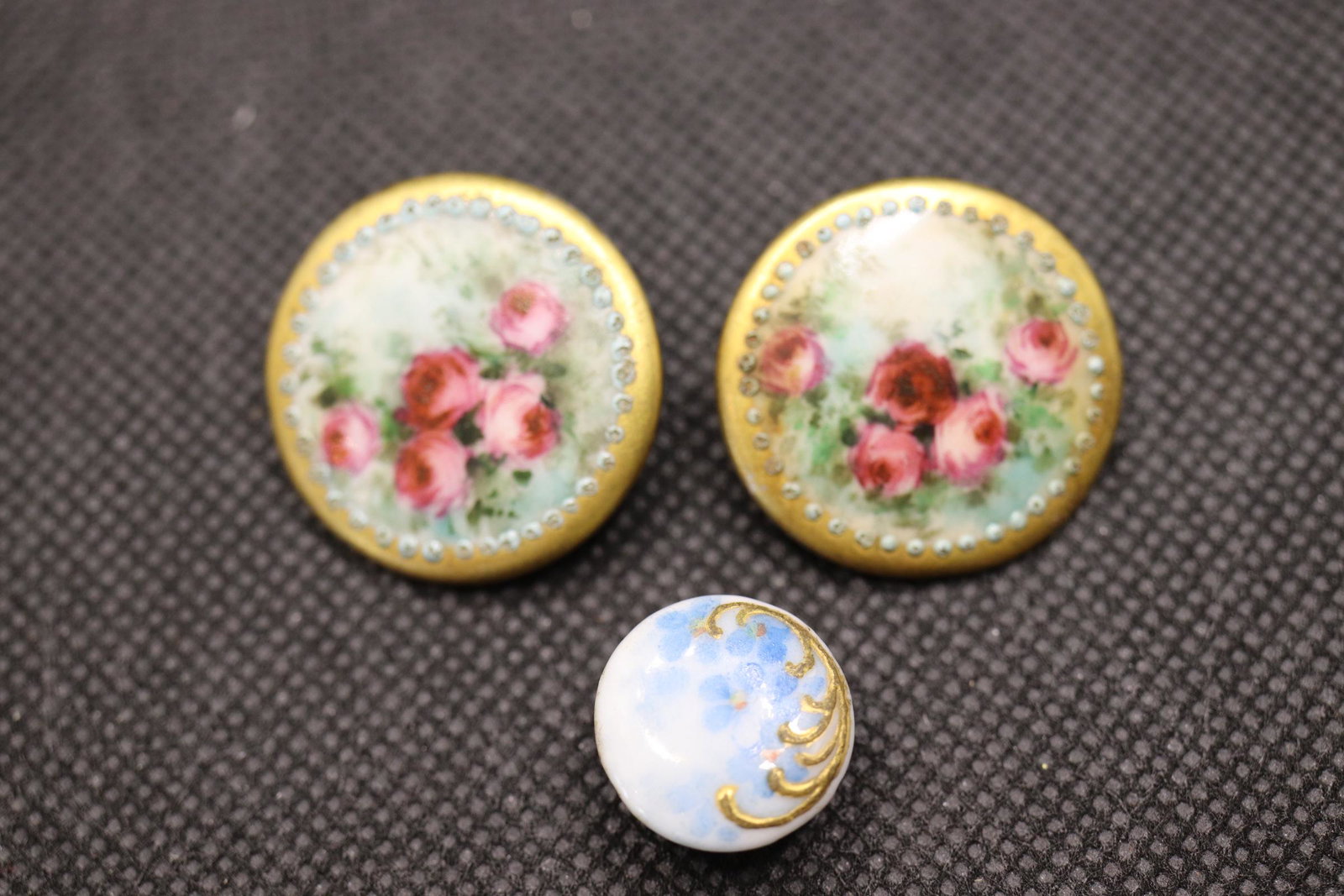Lot of 3 Victorian Hand Painted Porcelain Buttons: matched pair with red roses, and other