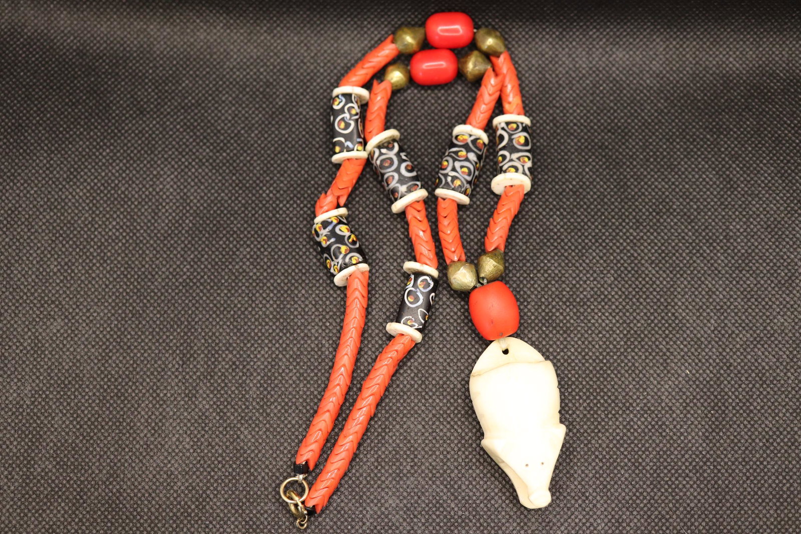 Antique Native American Coral & Trade Bead, Carved Bone: antique native american coral & trade bead necklace with carved bone animal, clasp is marked 1/20 12k gf, approx. 20 inch necklace and 2 inch pendant