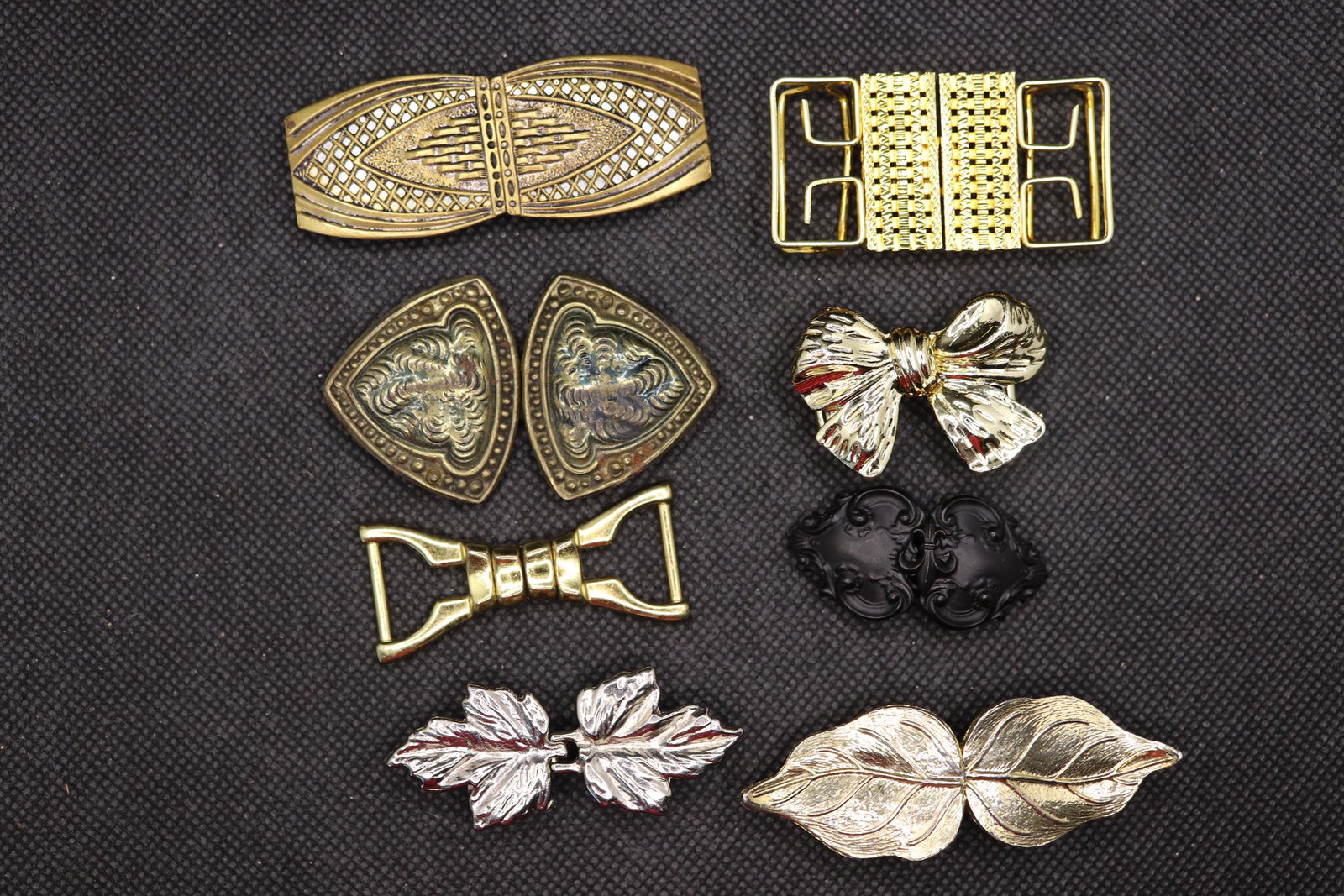 Lot of 8 Vintage & Antique Belt Buckles: one Czechoslovakia, bow, leaves, and others